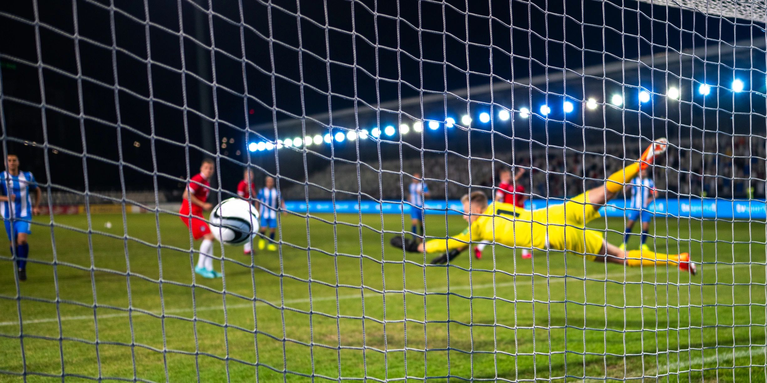 Soccer goalkeeper making a save during a match