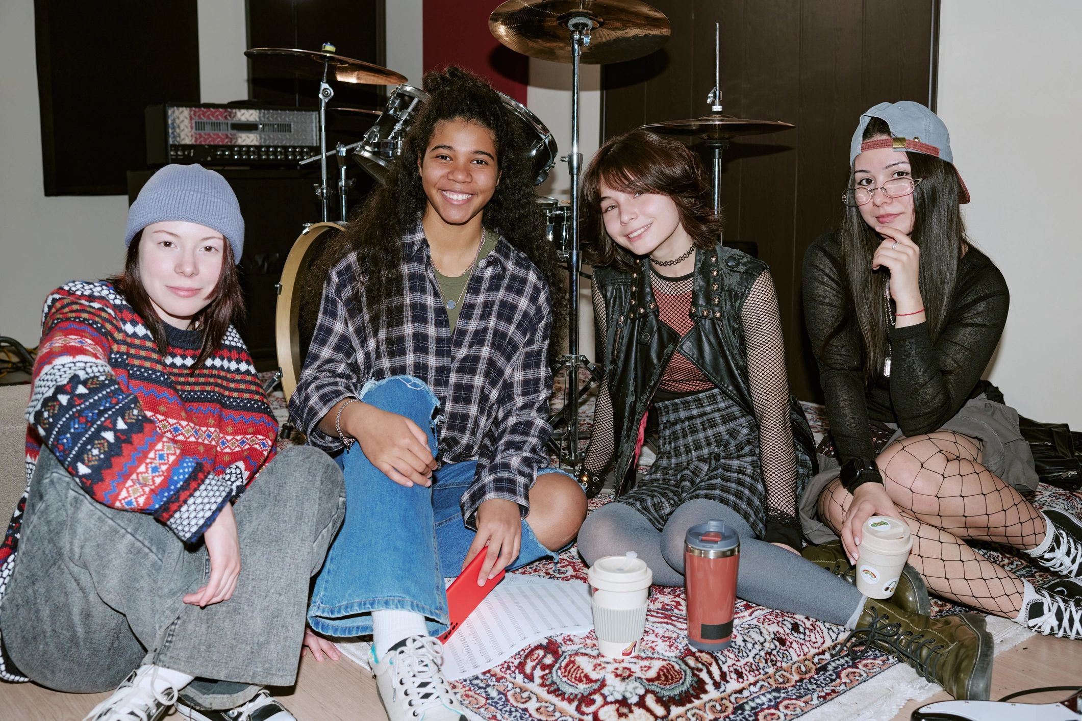 Diverse young creatives in a music studio