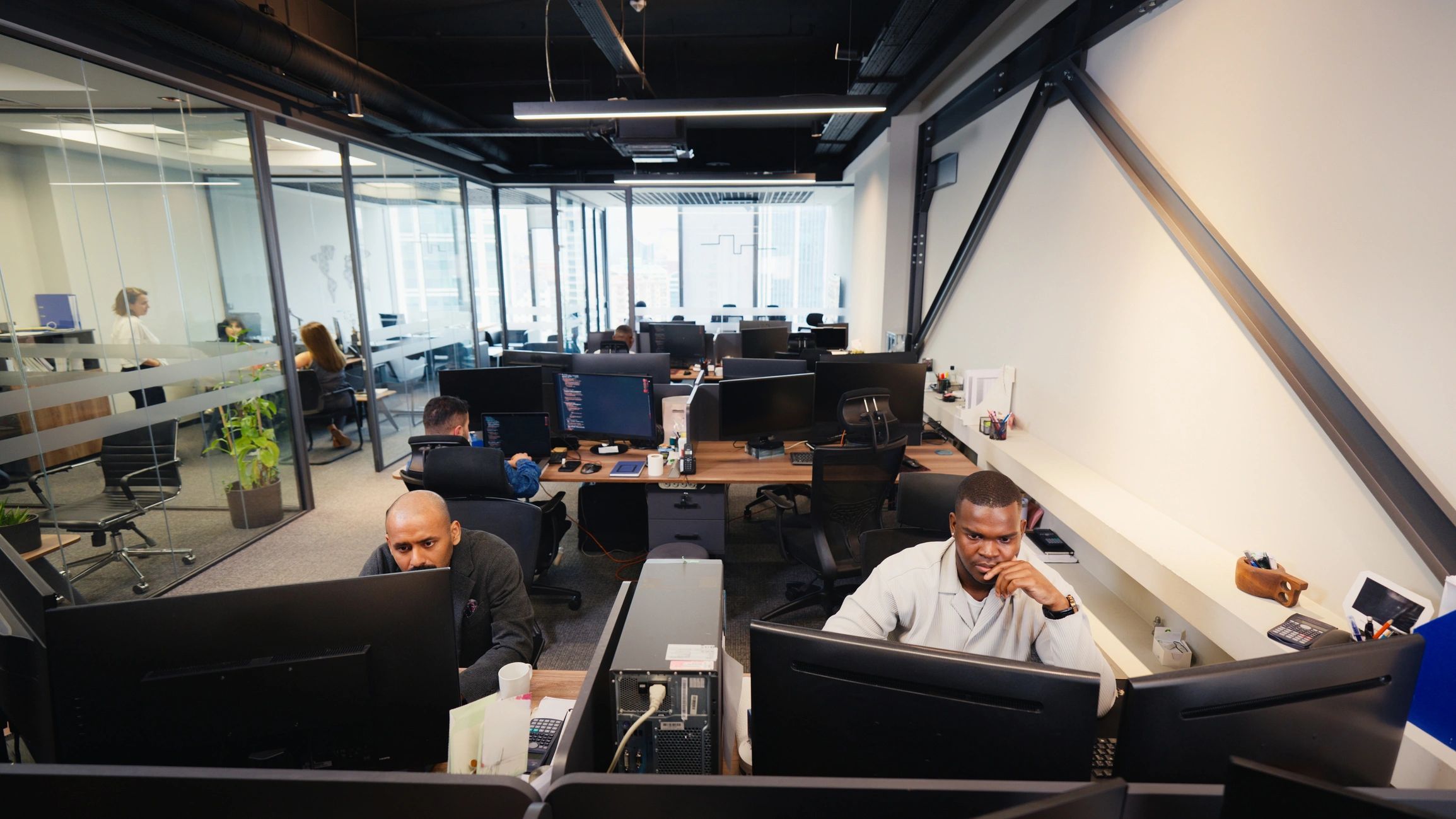 Editorial team working in a collaborative media office